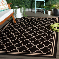 Safavieh Courtyard Alina Geometric Quatrefoil Indoor/Outdoor Area Rug, Black/Beige, 5'3