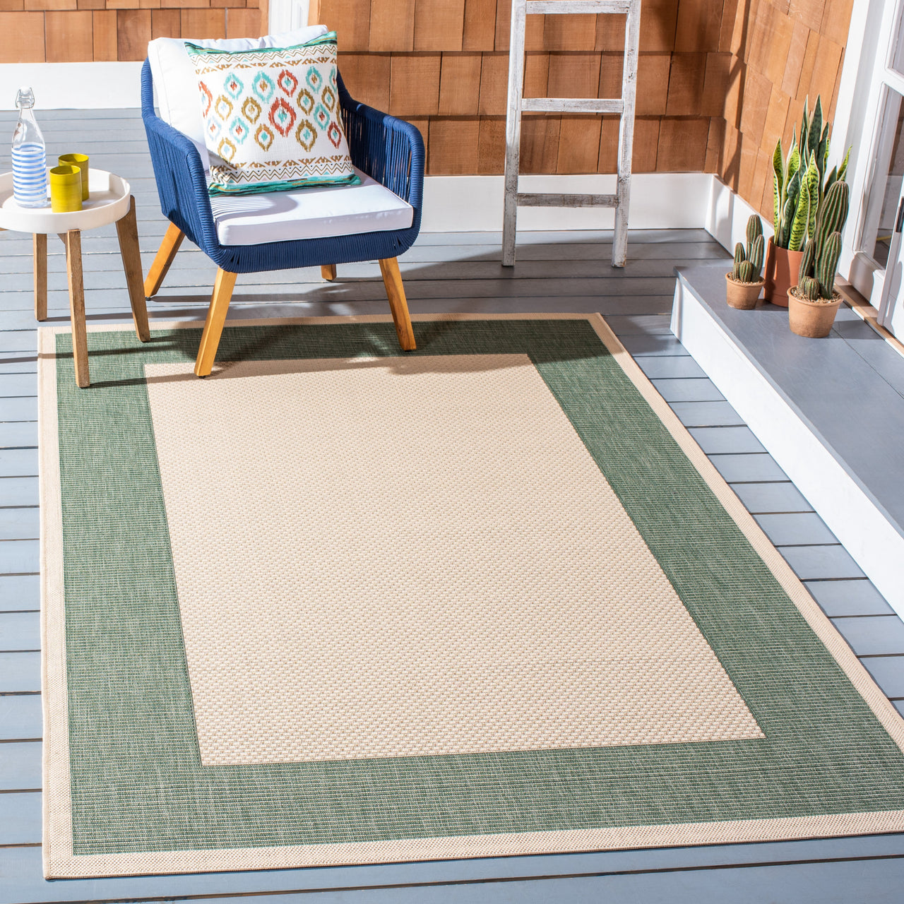 Safavieh Courtyard Justine Bordered Indoor/Outdoor Area Rug, Beige/Navy, 5'3" x 7'7"