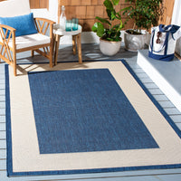 Safavieh Courtyard Justine Bordered Indoor/Outdoor Area Rug, Beige/Navy, 5'3