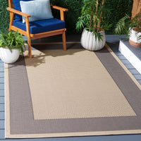 Safavieh Courtyard Justine Bordered Indoor/Outdoor Area Rug, Beige/Navy, 5'3