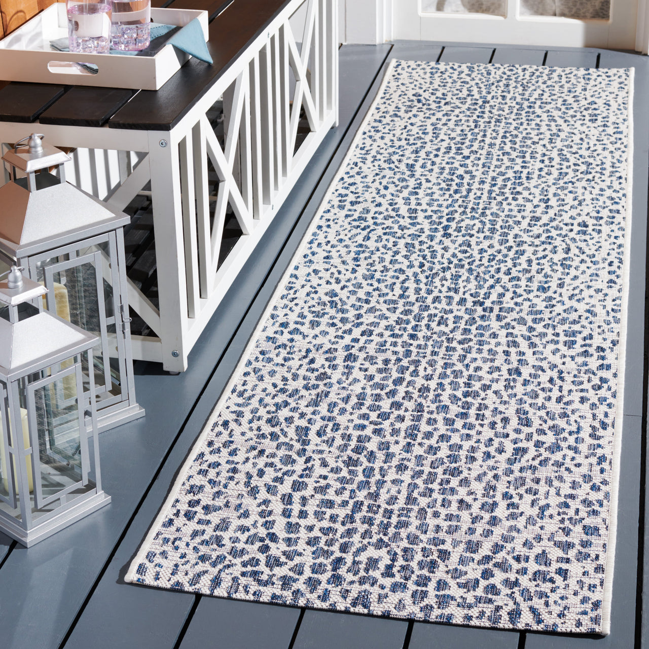 Safavieh Courtyard Karina Animal Indoor/Outdoor Area Rug, Gray/Black, 5'5" x 7'7"