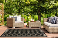 Safavieh Courtyard Alina Geometric Quatrefoil Indoor/Outdoor Area Rug, Black/Beige, 5'3