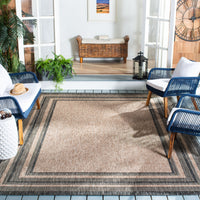 SAFAVIEH Courtyard Ercan Bordered Indoor/Outdoor Area Rug, Natural/Black, 8' x 10'